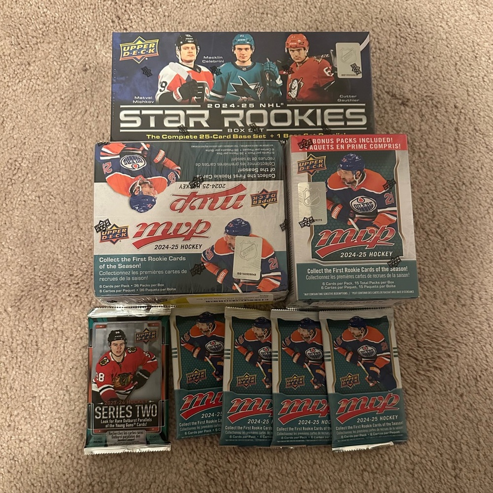 Assorted sealed boxes and packs sports trading cards